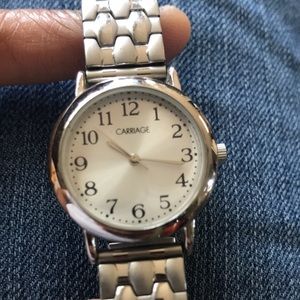 Ladies Carriage Silver Dial Watch By Timex. Stainless Steel Back & Stretch Band.